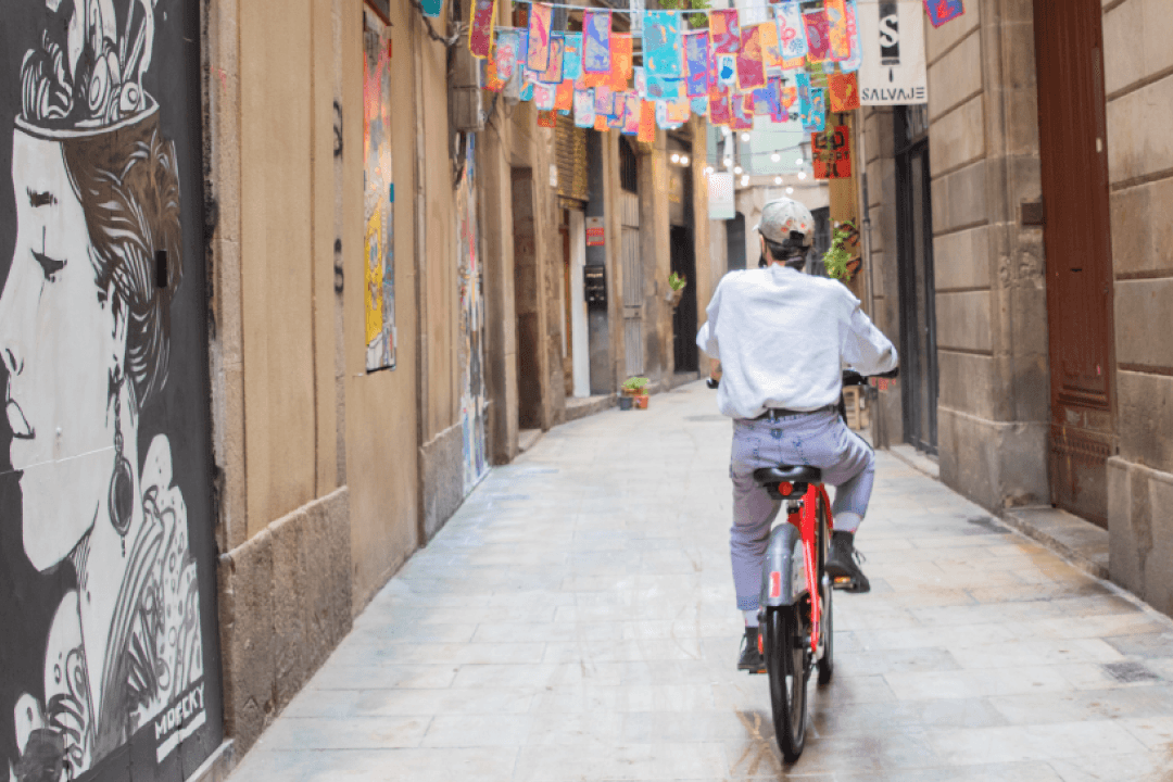 Photo source: Harbour.Space - Riding on Bicing through the neighborhood of El Born
