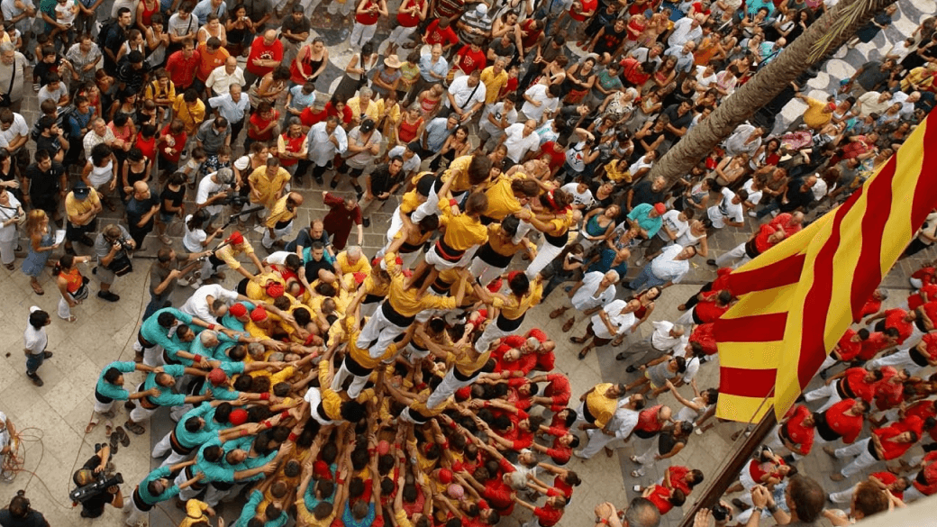 Photo source: Spain.Info - Catalonia's most famous traditions, Castellers