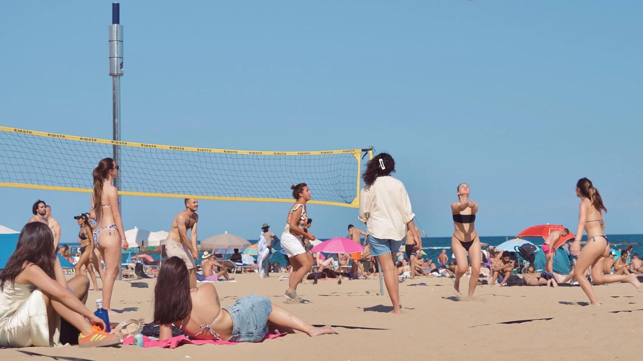 Photo source: Harbour.Space - Group of students playing volleyball